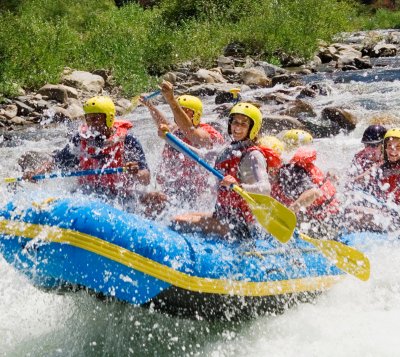 Volunteers white water rafting in costa rica.